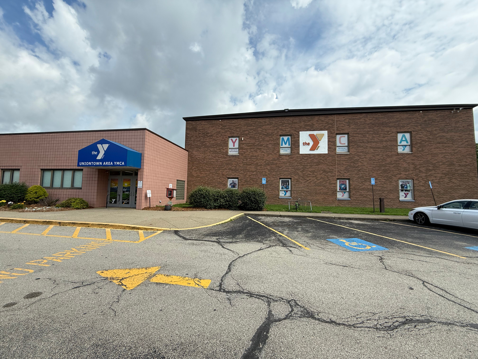 Current exterior - cracked parking lot